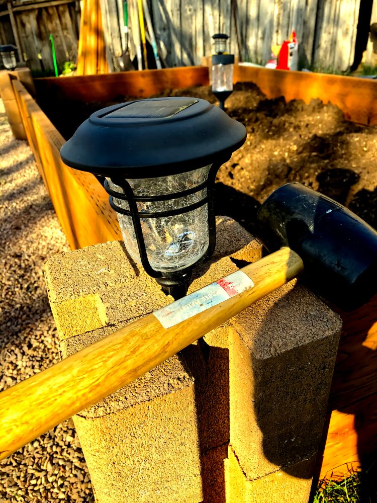 Garden bed and hammer