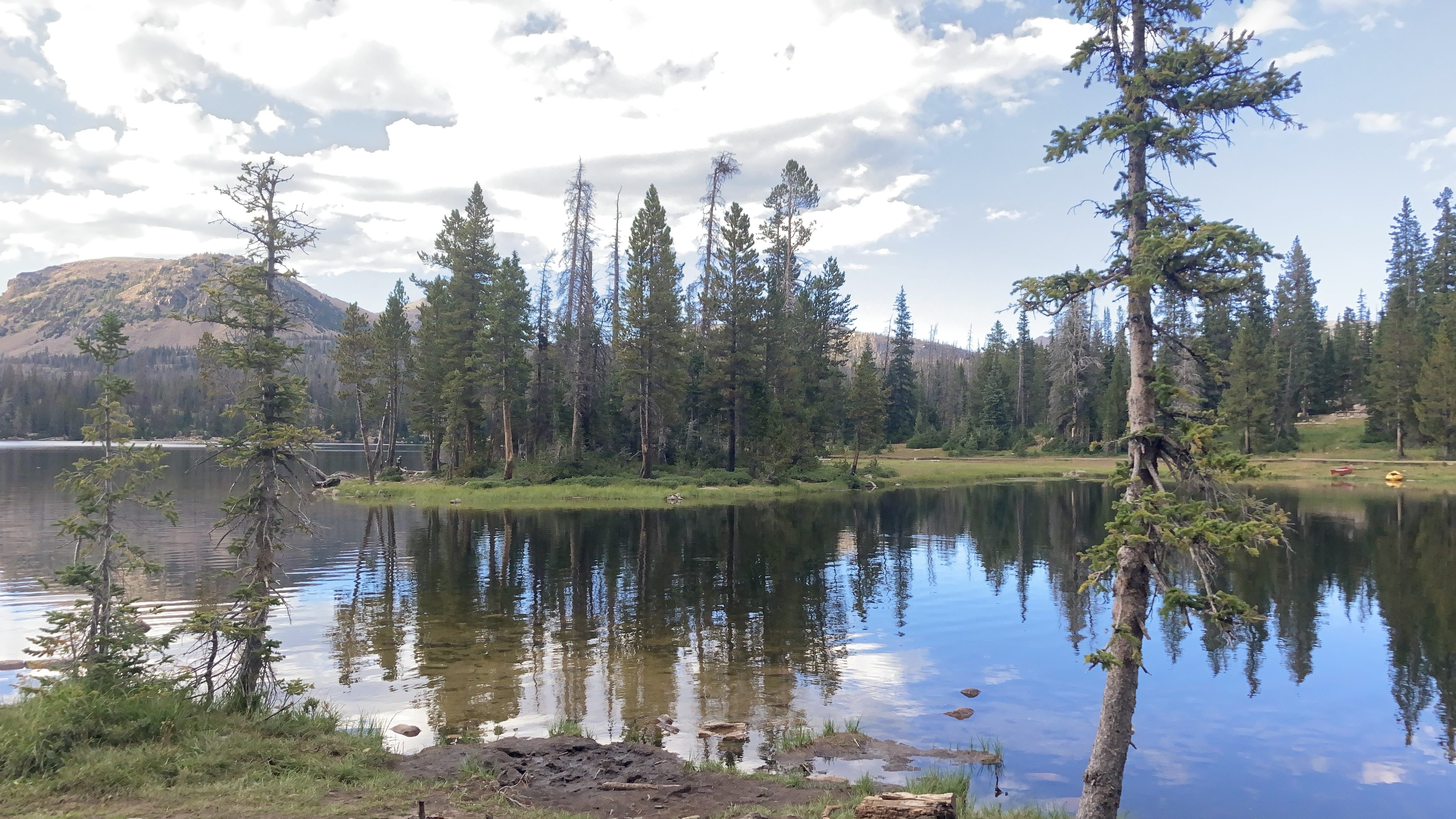 The small island on Mirror Lake in The Uintas Wilderness Area of the Uinat National Forest
